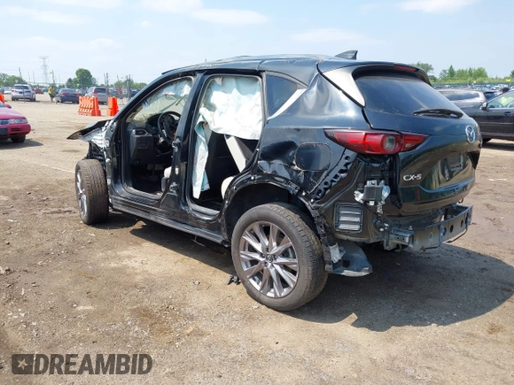 2020 Mazda CX-5 Grand Touring с VIN JM3KFADM2L0731972, выставлен на аукционе IAAI как лот 42686202 с пробегом Не указан миль и . История ставок и продаж доступна на DreamBid. Изображение 3.