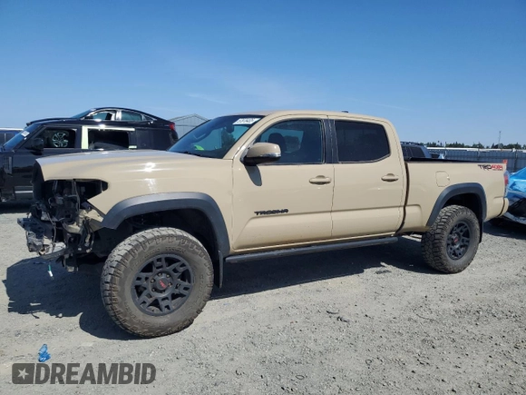 2020 Toyota Tacoma SR5 with VIN 3TMDZ5BN3LM087312, listed as a Copart auction lot 57876405 with 49,201 mi miles and Salvage title. Bid and sale history available at DreamBid. Image 1.