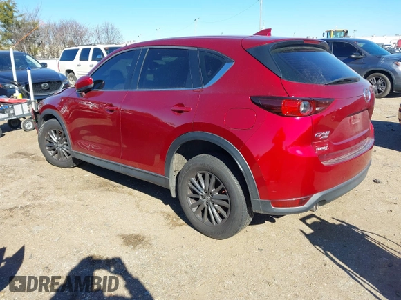 2019 Mazda CX-5 Sport with VIN JM3KFBBM2K0508743, listed as a IAAI auction lot 41288659 with 77,710 mi miles and . Bid and sale history available at DreamBid. Image 3.