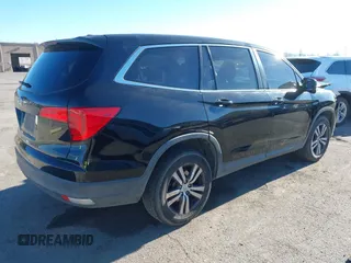 2018 Honda Pilot EX-L with VIN 5FNYF5H58JB013113, listed as a IAAI auction lot 41313206 with 125,825 mi miles. Bid and sale history available at carsss.com. Image 4.