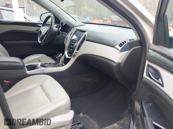 2013 Cadillac SRX Luxury Collection with VIN 3GYFNCE3XDS654531, listed as a IAAI auction lot 41931295 with 120,255 mi miles and . Bid and sale history available at carsss.com. Image 5.