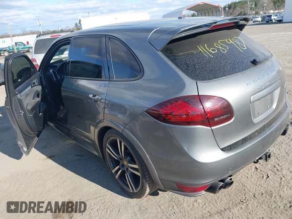 2014 Porsche Cayenne GTS z VIN WP1AD2A27ELA75187, wystawiony jako IAAI lot #41685987 z przebiegiem 77 962 mil mil oraz . Historia ofert i sprzedaży dostępna na DreamBid. Obrazek 3.