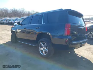 2015 Chevrolet Tahoe LTZ with VIN 1GNSKCKC6FR190314, listed as a IAAI auction lot 41672237 with 176,439 mi miles. Bid and sale history available at carsss.com. Image 3.