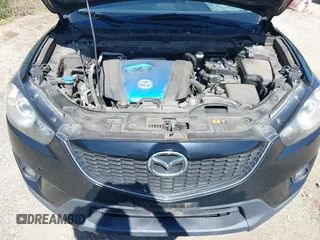 2013 Mazda CX-5 Grand Touring with VIN JM3KE4DE6D0127601, listed as a IAAI auction lot 42143558 with 95,719 mi miles and . Bid and sale history available at DreamBid. Image 10.