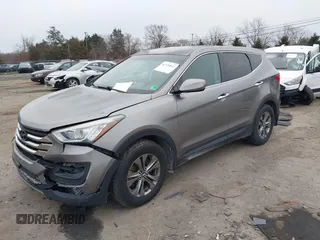 2014 Hyundai Santa Fe z VIN 5XYZTDLB5EG166650, wystawiony jako IAAI lot #41520847 z przebiegiem 197 250 mil mil oraz . Historia ofert i sprzedaży dostępna na DreamBid. Obrazek 16.