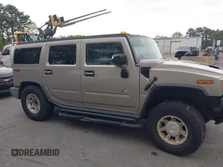 2003 Hummer H2 with VIN 5GRGN23U73H142389, listed as a IAAI auction lot 42219627 with 78,547 mi miles. Bid and sale history available at carsss.com. Image 13.