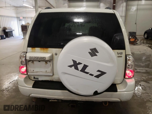 2004 Suzuki XL7 LX with VIN JS3TX92V044106650, listed as a Copart auction lot 76285514 with 185,356 mi miles and Salvage title. Bid and sale history available at DreamBid. Image 6.