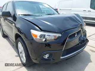 2012 Mitsubishi Outlander SE with VIN JA4AP4AU1CZ002844, listed as a IAAI auction lot 42297590 with 66,065 mi miles and . Bid and sale history available at DreamBid. Image 17.