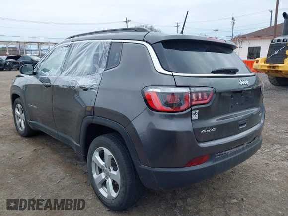 2018 Jeep Compass Latitude with VIN 3C4NJDBB8JT307154, listed as a IAAI auction lot 42056744 with 94,454 mi miles and . Bid and sale history available at DreamBid. Image 3.