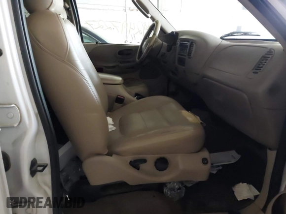 2003 Ford F-150 XLT with VIN 1FTRW08L03KB51627, listed as a IAAI auction lot 42497227 with 330,207 mi miles and . Bid and sale history available at DreamBid. Image 5.