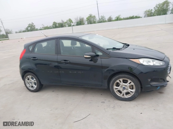 2016 Ford Fiesta SE with VIN 3FADP4EJ3GM203760, listed as a IAAI auction lot 41928386 with 52,744 mi miles. Bid and sale history available at carsss.com. Image 12.