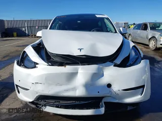 2022 Tesla Model Y Long Range with VIN 7SAYGDEE1NF402745, listed as a IAAI auction lot 41493850 with 11,222 mi miles and . Bid and sale history available at DreamBid. Image 12.