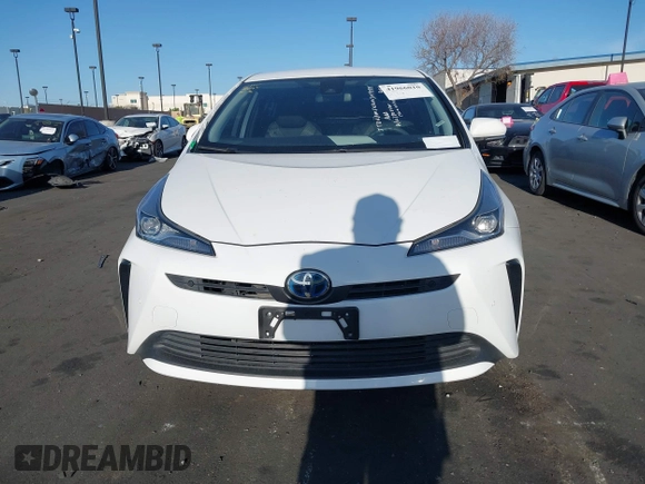 2021 Toyota Prius L Eco with VIN JTDKAMFU0M3149875, listed as a IAAI auction lot 41966010 with 99,542 mi miles. Bid and sale history available at carsss.com. Image 13.