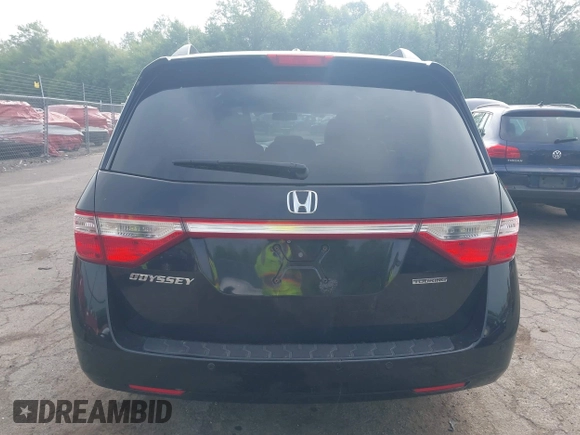 2011 Honda Odyssey Touring with VIN 5FNRL5H93BB104906, listed as a IAAI auction lot 42371279 with 183,856 mi miles and . Bid and sale history available at DreamBid. Image 16.