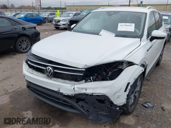 2022 Volkswagen Tiguan SE with VIN 3VV3B7AX0NM161398, listed as a IAAI auction lot 41290692 with 47,970 mi miles and . Bid and sale history available at DreamBid. Image 6.