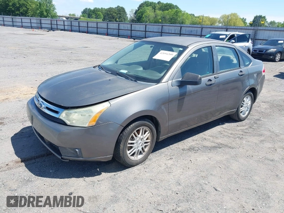 2009 Ford Focus SE with VIN 1FAHP35NX9W108176, listed as a IAAI auction lot 42094209 with 246,714 mi miles. Bid and sale history available at carsss.com. Image 2.