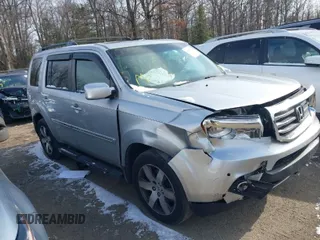2014 Honda Pilot Touring with VIN 5FNYF4H9XEB038551, listed as a IAAI auction lot 41585720 with 150,725 mi miles and . Bid and sale history available at carsss.com. Image 1.