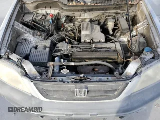 1999 Honda CR-V LX with VIN JHLRD2844XC016583, listed as a Copart auction lot 73747274 with 104,730 mi miles and Salvage Title. Bid and sale history available at carsss.com. Image 12.