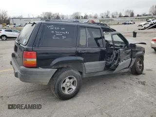 1998 Jeep Grand Cherokee Laredo with VIN 1J4FX58S1WC348125, listed as a Copart auction lot 86061674 with 0 mi miles and Salvage Title. Bid and sale history available at carsss.com. Image 3.