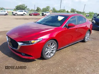 2024 Mazda 3 S Preferred with VIN 3MZBPACM3RM402675, listed as a IAAI auction lot 42612224 with 14,244 mi miles and . Bid and sale history available at DreamBid. Image 2.