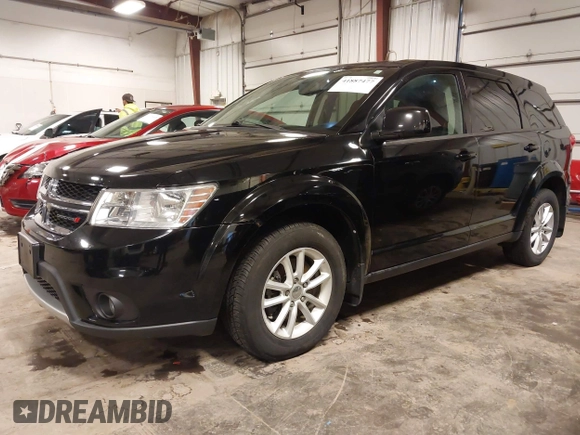 2015 Dodge Journey SXT with VIN 3C4PDDBG5FT518699, listed as a IAAI auction lot 41887477 with 118,966 mi miles and . Bid and sale history available at DreamBid. Image 2.
