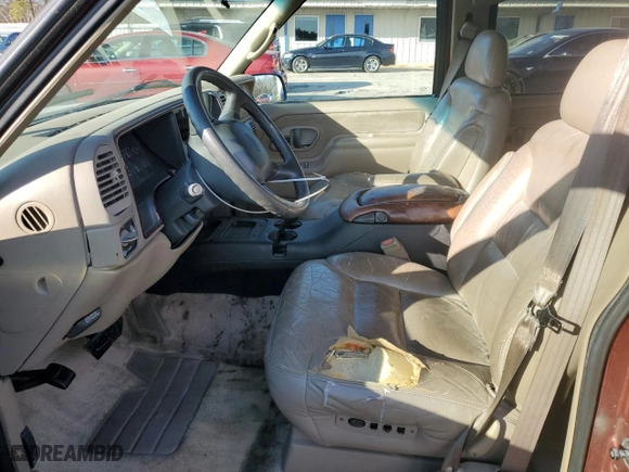 1999 Chevrolet Tahoe with VIN 1GNEC13RXXJ385740, listed as a Copart auction lot 86870484 with 271,302 mi miles and Salvage Title. Bid and sale history available at carsss.com. Image 7.