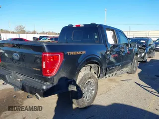 2022 Ford F-150 XL with VIN 1FTEW1E8XNFC14085, listed as a IAAI auction lot 41255521 with 64,603 mi miles and . Bid and sale history available at DreamBid. Image 4.