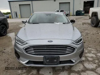 2020 Ford Fusion SEL с VIN 3FA6P0CD4LR148327, выставлен на аукционе Copart как лот 55099855 с пробегом Не указан миль и Списание • Salvage title. История ставок и продаж доступна на DreamBid. Изображение 5.