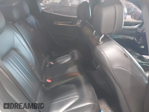 2016 Maserati Ghibli S Q4 с VIN ZAM57RTA6G1173547, выставлен на аукционе IAAI как лот 41823427 с пробегом 70 506 миль миль и . История ставок и продаж доступна на DreamBid. Изображение 8.
