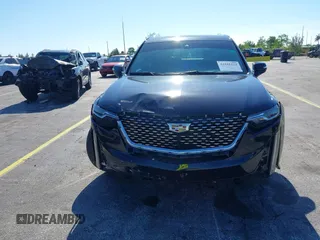 2020 Cadillac XT6 FWD Premium Luxury with VIN 1GYKPCRS7LZ211197, listed as a IAAI auction lot 42231424 with 57,351 mi miles and . Bid and sale history available at DreamBid. Image 12.