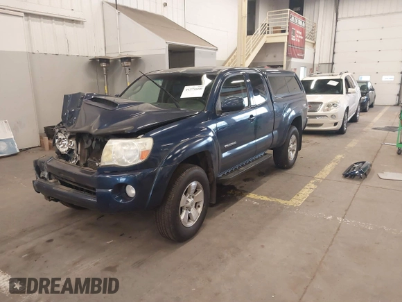 2006 Toyota Tacoma with VIN 5TEUU42N06Z265256, listed as a IAAI auction lot 41371660 with 153,557 mi miles. Bid and sale history available at carsss.com. Image 18.