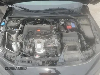 2023 Honda Civic Sport z VIN 2HGFE2F57PH520634, wystawiony jako Copart lot #51852665 z przebiegiem 52 641 mil mil oraz Szkoda całkowita • Salvage title. Historia ofert i sprzedaży dostępna na DreamBid. Obrazek 13.
