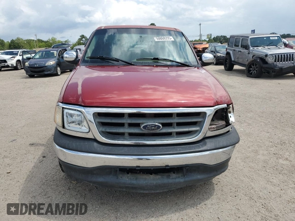 2001 Ford F-150 XLT with VIN 1FTRW076X1KC42302, listed as a Copart auction lot 59868295 with 234,772 mi miles and Salvage title. Bid and sale history available at DreamBid. Image 5.