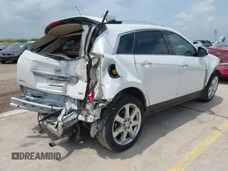 2012 Cadillac SRX Premium Collection с VIN 3GYFNCE36CS557597, выставлен на аукционе IAAI как лот 42115362 с пробегом 122 434 миль миль и . История ставок и продаж доступна на DreamBid. Изображение 4.