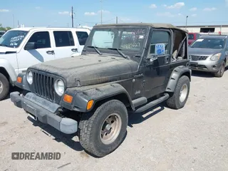 1998 Jeep Wrangler SE with VIN 1J4FY29P1WP806244, listed as a IAAI auction lot 41885627 with 131,486 mi miles. Bid and sale history available at carsss.com. Image 2.