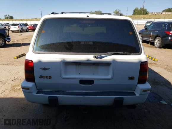 1994 Jeep Grand Cherokee Limited with VIN 1J4GZ78Y1RC336544, listed as a Copart auction lot 74262574 with 172,070 mi miles and Salvage Title. Bid and sale history available at carsss.com. Image 6.
