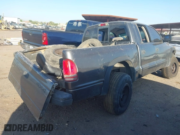 2002 Dodge Dakota with VIN 1B7HG38Z62S553505, listed as a IAAI auction lot 42499787 with 356,218 mi miles and . Bid and sale history available at DreamBid. Image 4.