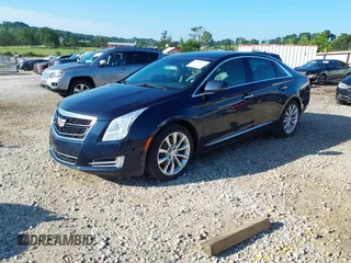 2016 Cadillac XTS Luxury Collection with VIN 2G61M5S37G9123956, listed as a IAAI auction lot 42421872 with 107,586 mi miles and . Bid and sale history available at DreamBid. Image 2.