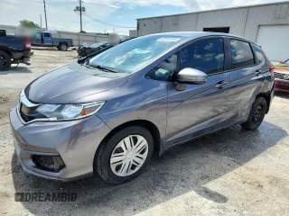 2019 Honda Fit LX с VIN 3HGGK5H44KM744618, выставлен на аукционе Copart как лот 64378165 с пробегом 20 276 миль миль и Списание • Salvage title. История ставок и продаж доступна на DreamBid. Изображение 1.