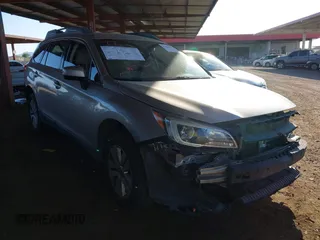 2015 Subaru Outback Premium with VIN 4S4BSACC0F3325927, listed as a IAAI auction lot 42450142 with 140,566 mi miles and . Bid and sale history available at DreamBid. Image 1.