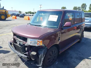 2004 Scion xB with VIN JTLKT334240132199, listed as a IAAI auction lot 41982258 with 164,546 mi miles. Bid and sale history available at carsss.com. Image 2.