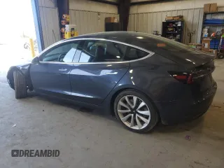 2018 Tesla Model 3 Long Range Battery with VIN 5YJ3E1EA5JF059313, listed as a Copart auction lot 51039105 with 73,706 mi miles and Salvage Title. Bid and sale history available at carsss.com. Image 2.