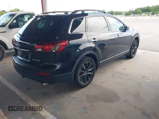 2014 Mazda CX-9 Grand Touring z VIN JM3TB2DA3E0439407, wystawiony jako IAAI lot #42332095 z przebiegiem 108 333 mil mil oraz . Historia ofert i sprzedaży dostępna na DreamBid. Obrazek 4.
