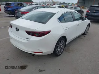 2020 Mazda 3 Select with VIN JM1BPACL1L1171032, listed as a IAAI auction lot 42366156 with 94,055 mi miles and . Bid and sale history available at DreamBid. Image 4.