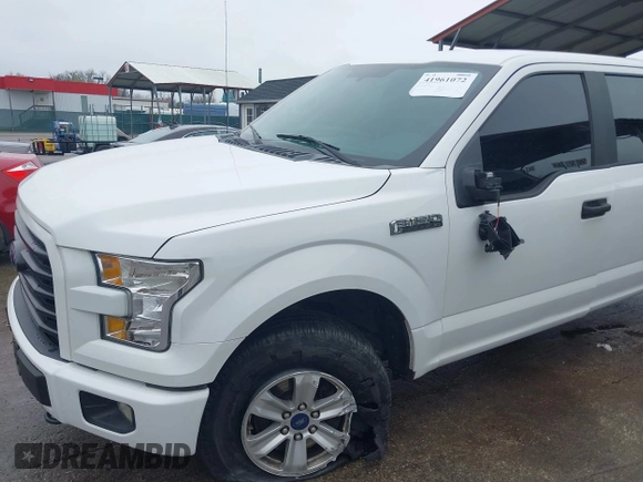 2015 Ford F-150 XLT with VIN 1FTEW1E80FFB30827, listed as a IAAI auction lot 41961072 with 155,206 mi miles and . Bid and sale history available at DreamBid. Image 6.