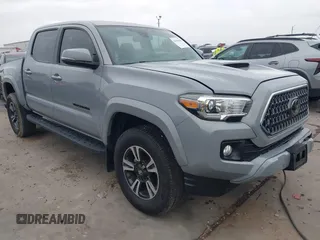 2018 Toyota Tacoma SR5 with VIN 5TFAZ5CNXJX065431, listed as a IAAI auction lot 41491056 with 39,024 mi miles and . Bid and sale history available at DreamBid. Image 1.