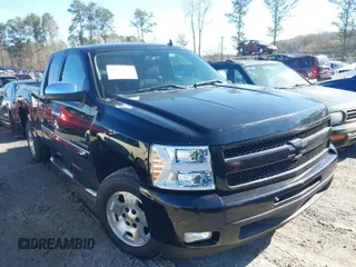 2011 Chevrolet Silverado 1500 LT with VIN 1GCRCSE03BZ335576, listed as a IAAI auction lot 41763158 with 35,574 mi miles and . Bid and sale history available at DreamBid. Image 1.