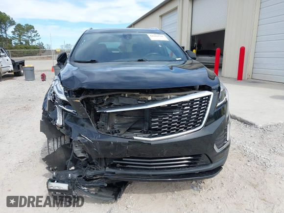 2020 Cadillac XT5 Luxury FWD with VIN 1GYKNAR47LZ233129, listed as a IAAI auction lot 41686521 with 29,012 mi miles and . Bid and sale history available at DreamBid. Image 6.