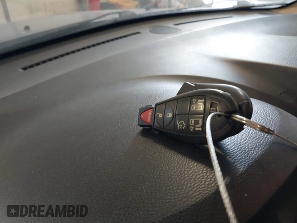 2014 Dodge Grand Caravan SXT with VIN 2C4RDGCG9ER213426, listed as a IAAI auction lot 41044553 with 175,140 mi miles and . Bid and sale history available at DreamBid. Image 11.