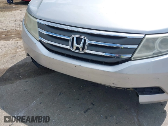 2012 Honda Odyssey EX-L with VIN 5FNRL5H67CB139701, listed as a IAAI auction lot 42233283 with 147,143 mi miles and . Bid and sale history available at DreamBid. Image 6.